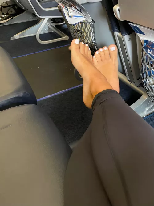 Am I lucky? I got the whole row! Do you think anyone will notice my perfect feet as they walk by?