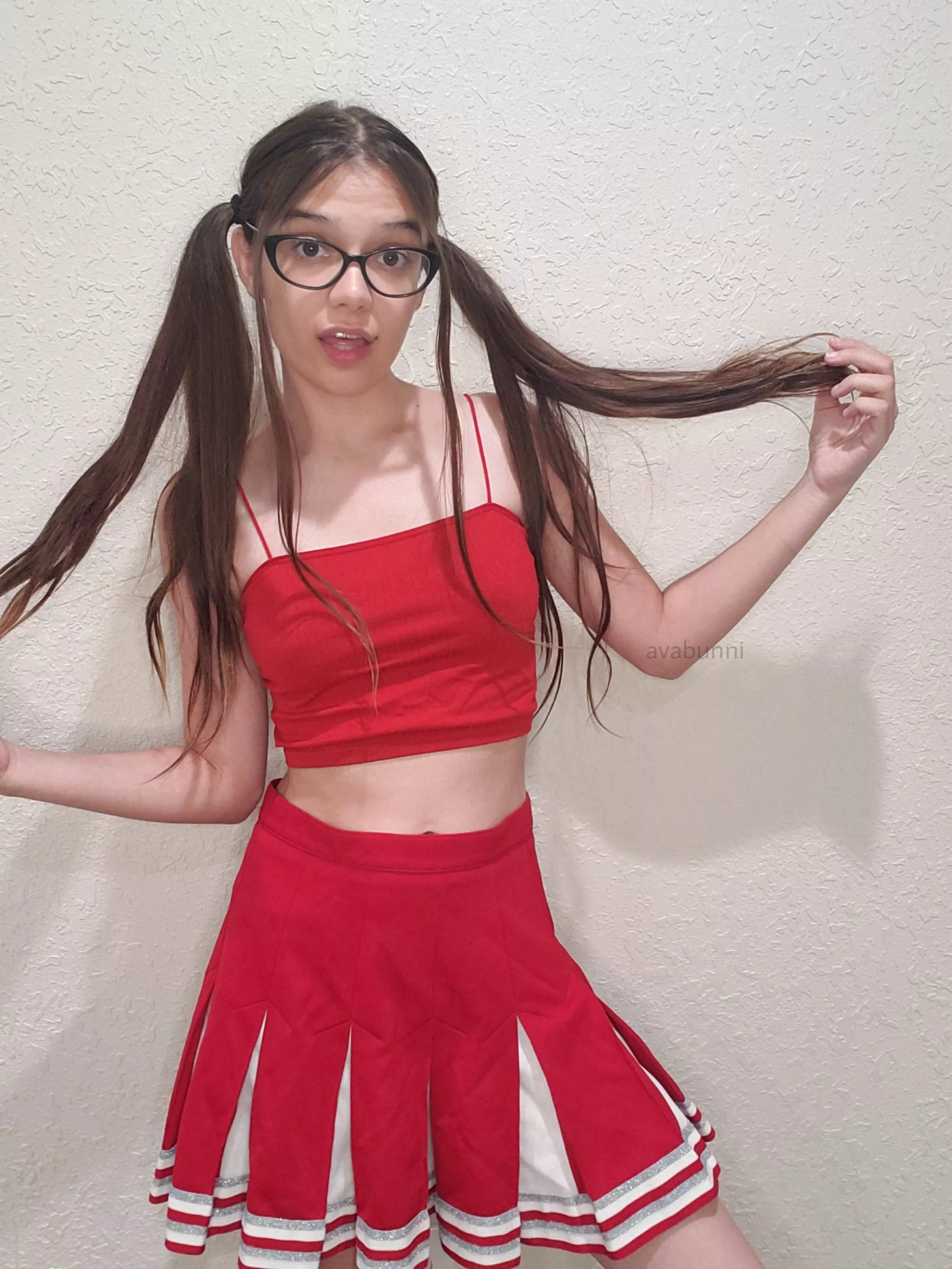 Cheer leader with pigtails what could be better