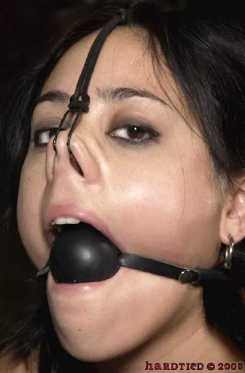 Gags and nose hooks make bondage even more fun