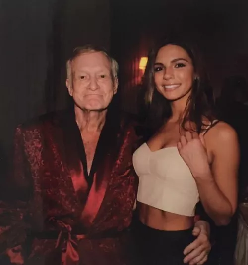 Hef has his hand really comfortably around her and she doesn’t seem to mind. Anyone else think they must’ve did something together?