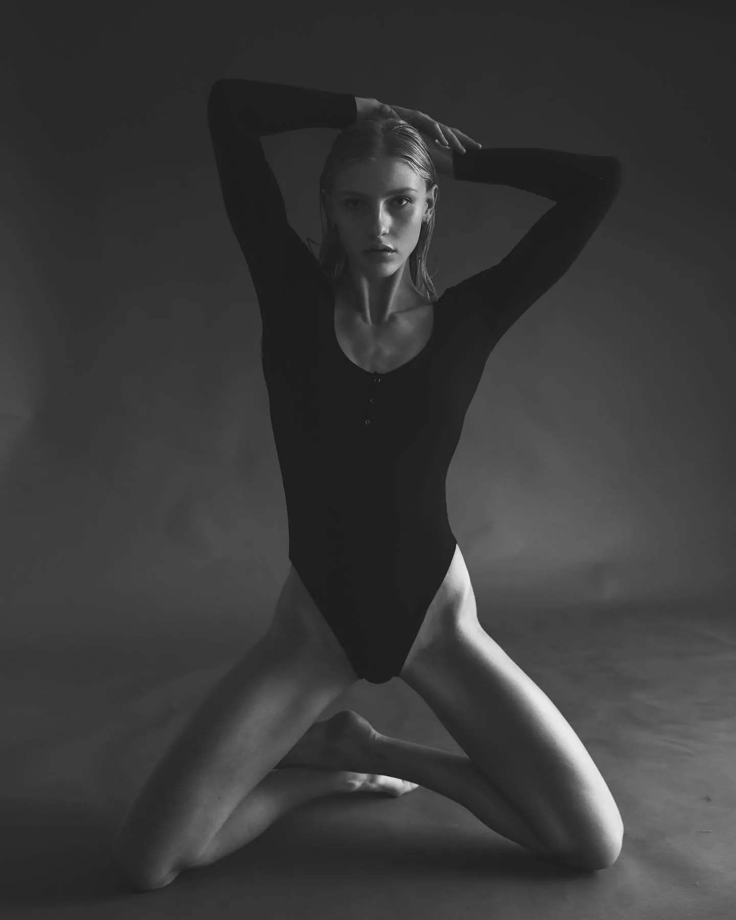On her knees
