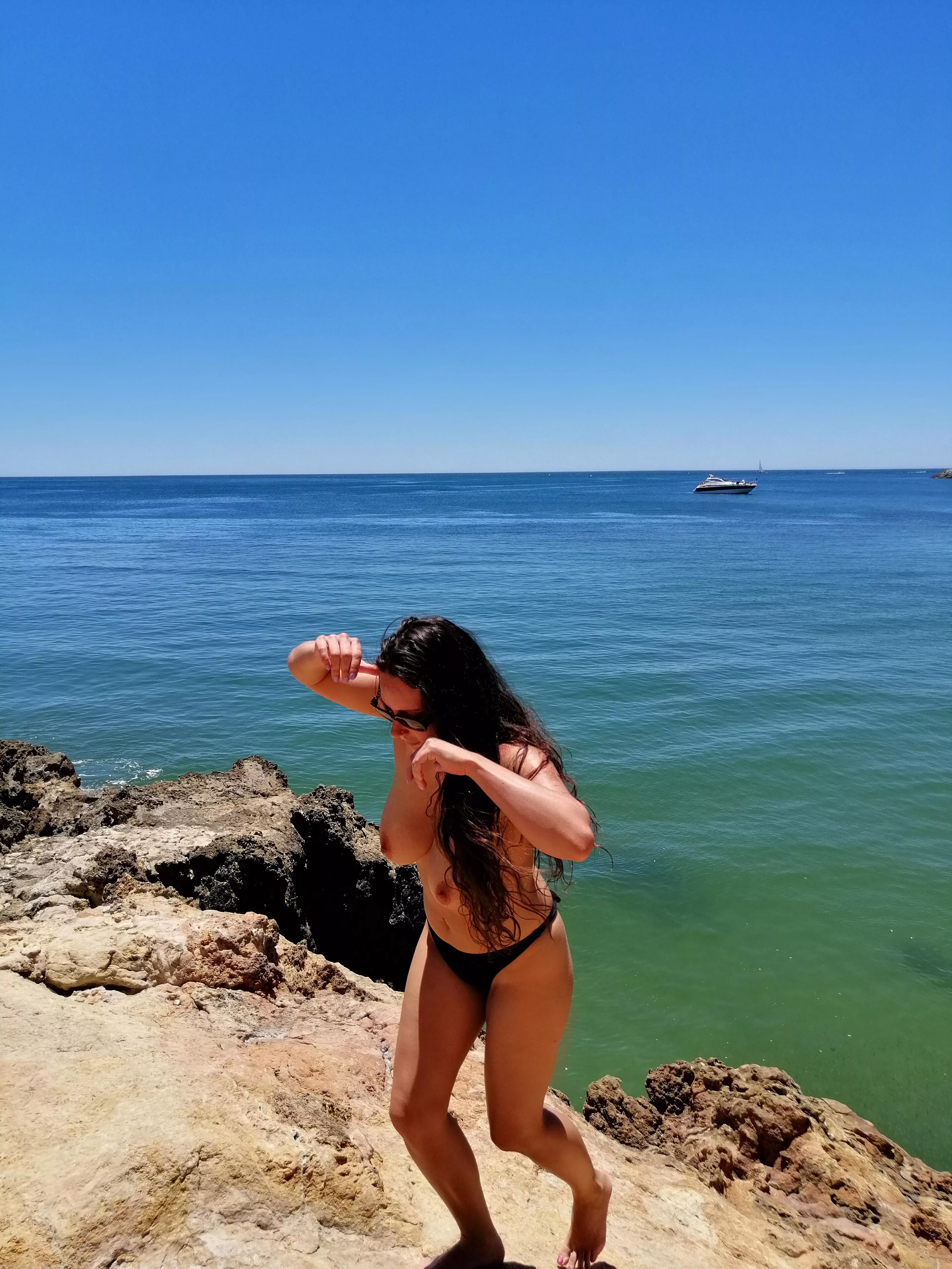 climbing on the rocks for better views