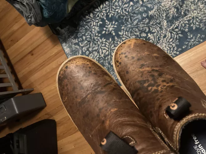 Looking for advice on leather care. These boots were in a closet under a Damp Rid bag that leaked – basically a solution of water, calcium chloride, sodium chloride, and potassium chloride. Didn’t discover it for a few days, and it spattered on my bo