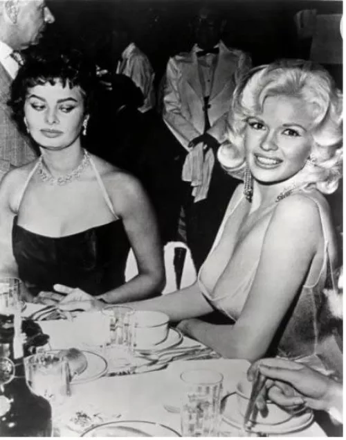 One of the first examples of breast envy. Sofia Loren gives side-eye to Jayne Mansfield’s ample bosom.