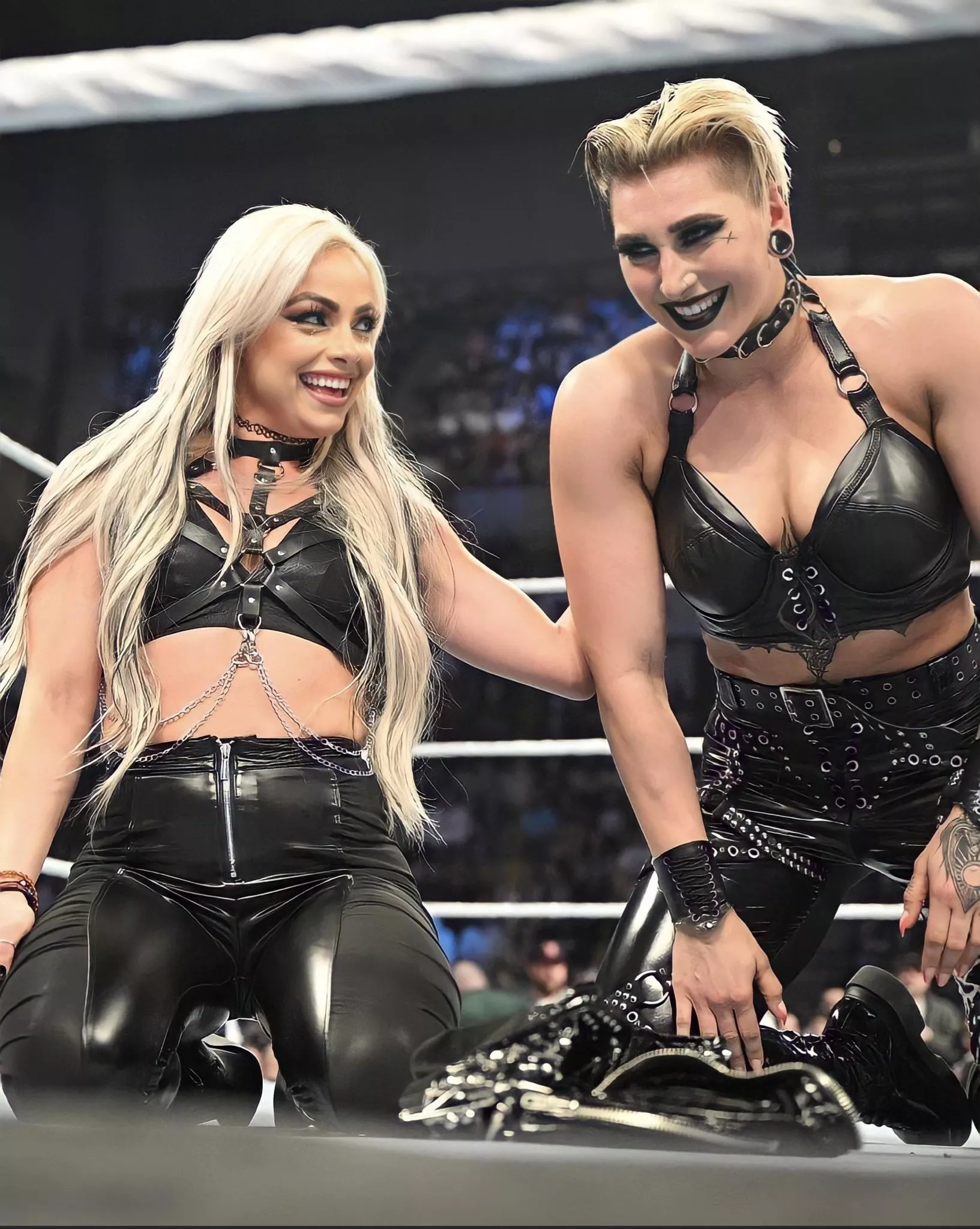 Liv and Rhea on their knees.