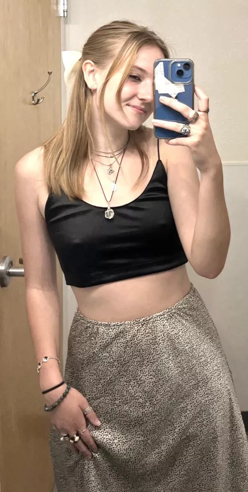 Teen proudly showing off her bust