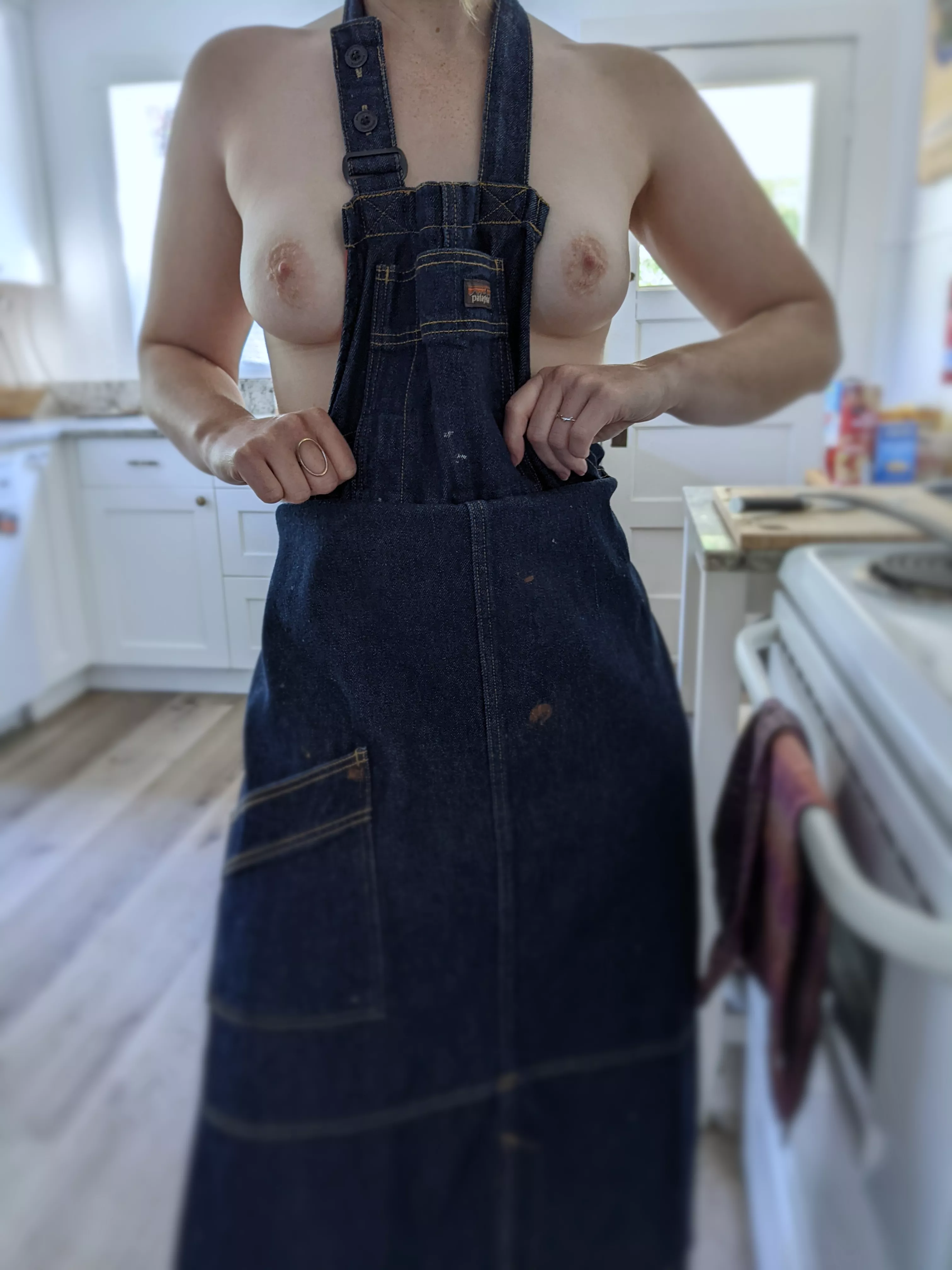 Sometimes she'll cook me dinner in nothing but my denim work apron. Tonight was one of those times.