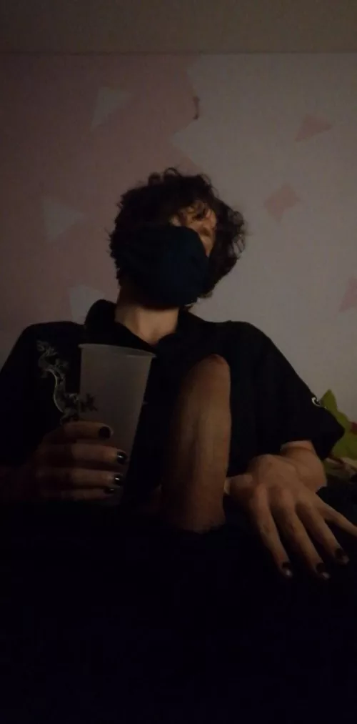 Next to an 8 inch cup