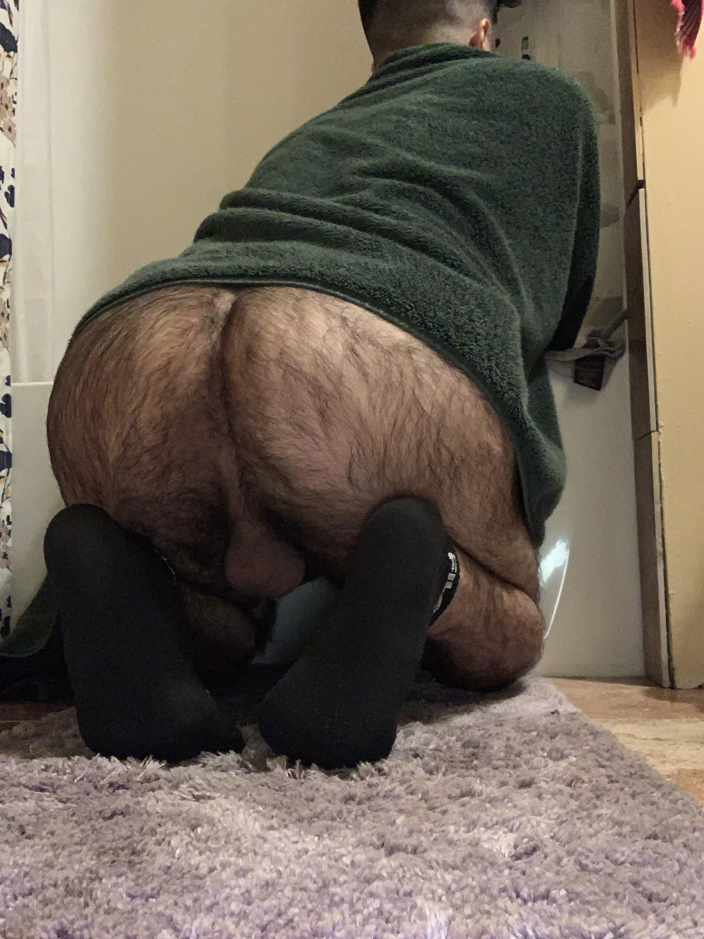Getting ready for a shower after long day at work