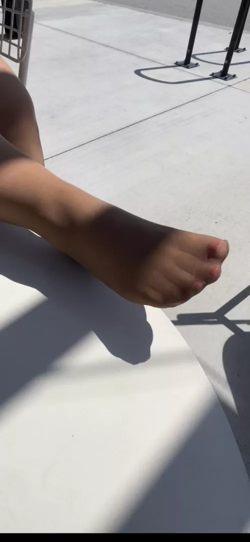 Soaking up some sun in my suntan pantyhose.