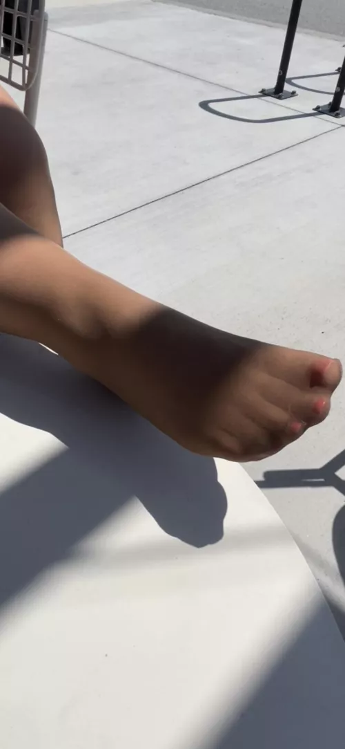 Soaking up some sun in my suntan pantyhose.