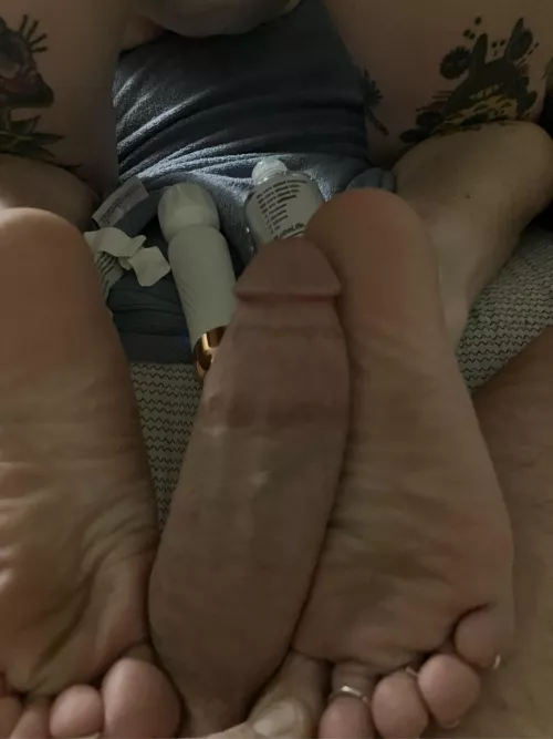 Daddy’s soft cock compared to my size 8 soles.