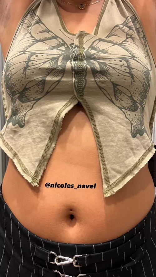 At the Mall trying on new crop tops.