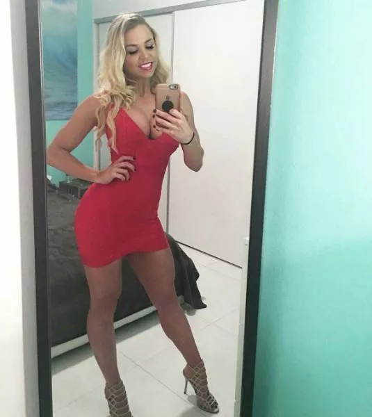 Blonde with great cleavage and strong thighs!