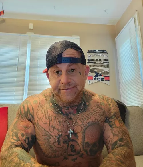 47 M Tattooed neck to waist.