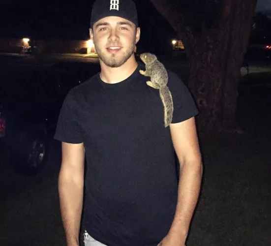 Enjoy this lil baby squirrel. was cute an sweet.