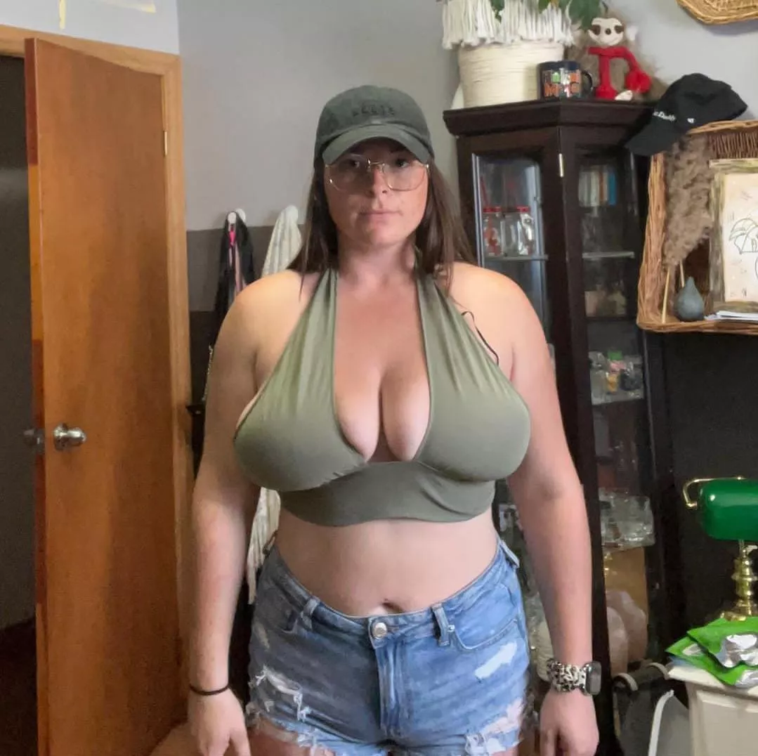 Her shirt can barely handle those massive tits!