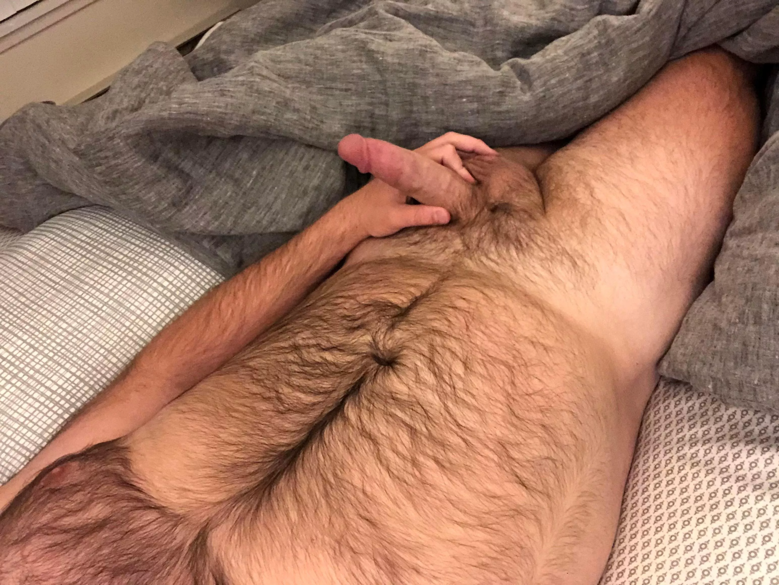 Rainy Sunday in bed. Come cuddle.