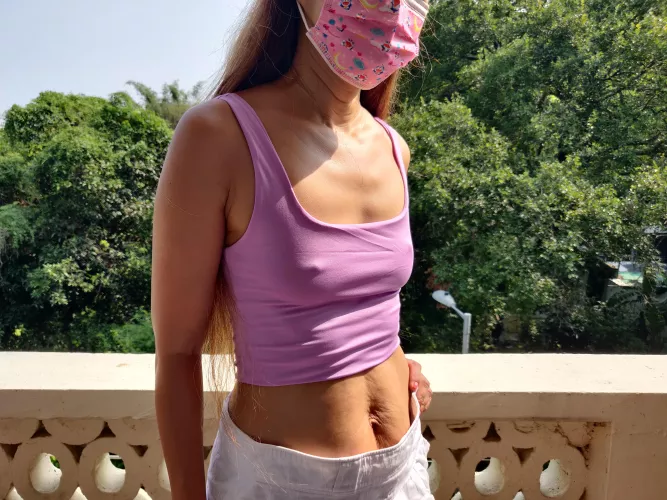 I'm Asian and don't wear a bra any more. Do you think this top is too short?