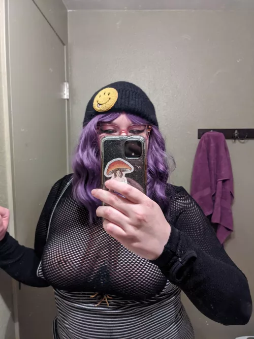 tits in a fishnet top