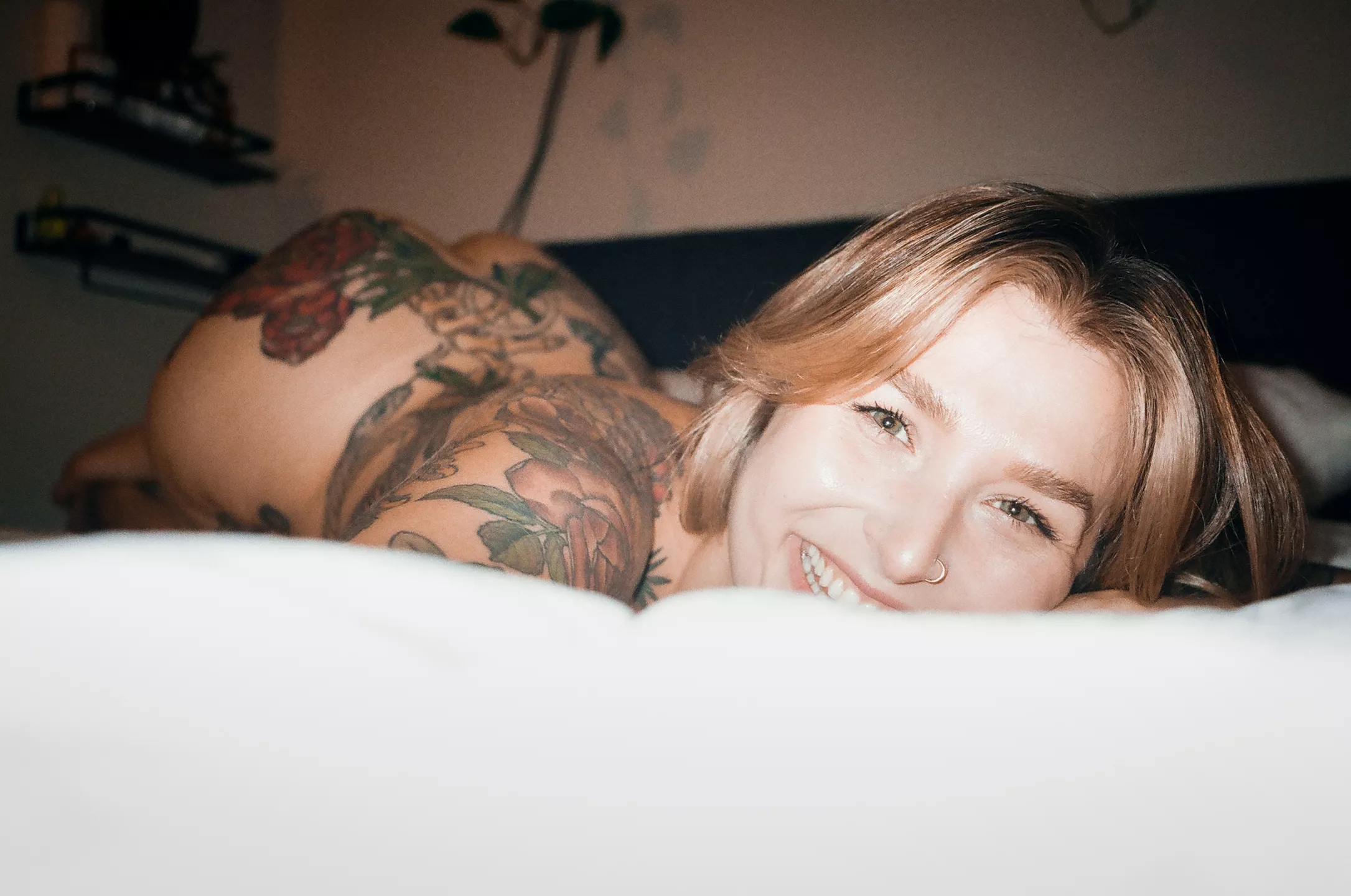 Smiling and waiting for you to get behind me