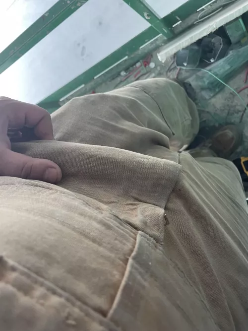 My cock is hard at work… and you see the outline on my carrharts.