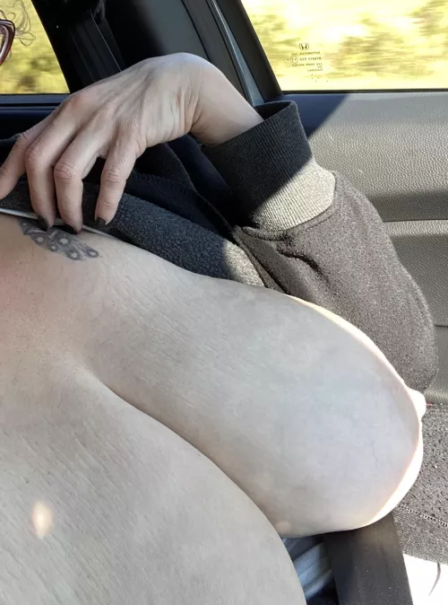 Showing off my titties in Ocean City! If you’re lucky enough to be on a balcony, I just might flash you!