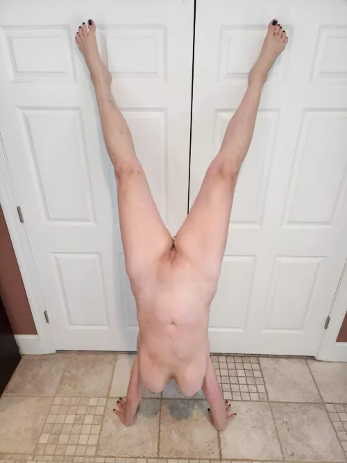 (F) 58. Wanted to see if I could still do a handstand.