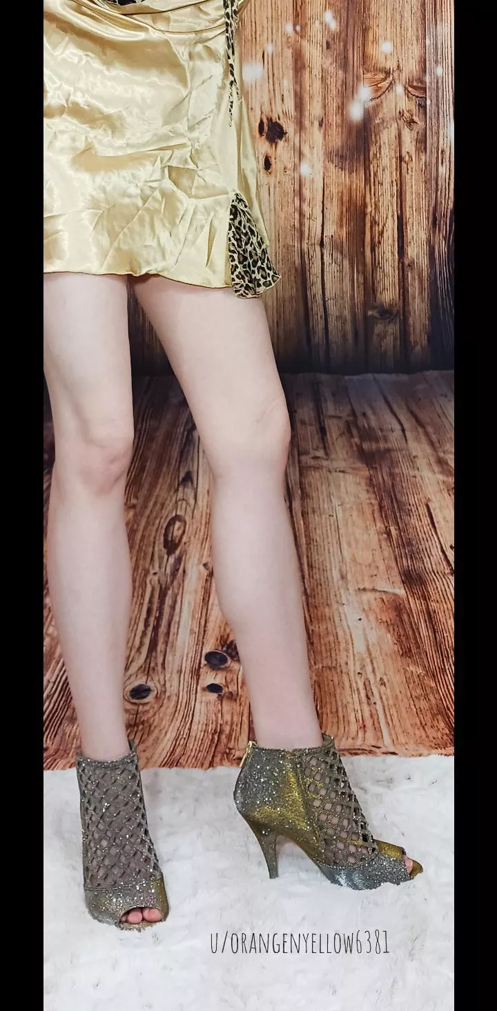 Silver sparkly heels with a gold shift.