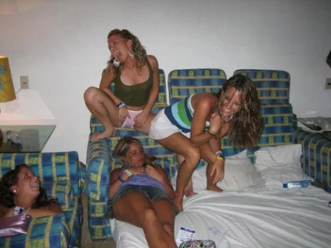 Think she might be farting in her sleeping friends face, at the very least she’s giving her a good panty flash