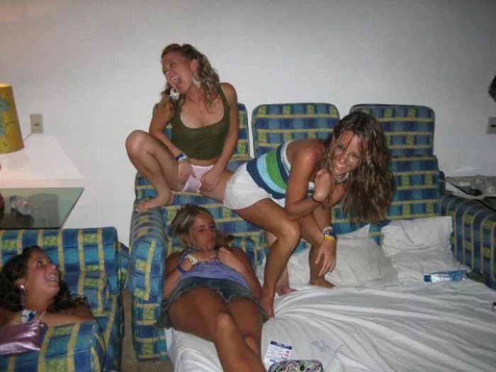 Think she might be farting in her sleeping friends face, at the very least she’s giving her a good panty flash Think she might be farting in her sleeping friends face, at the very least she’s giving her a good panty flash
