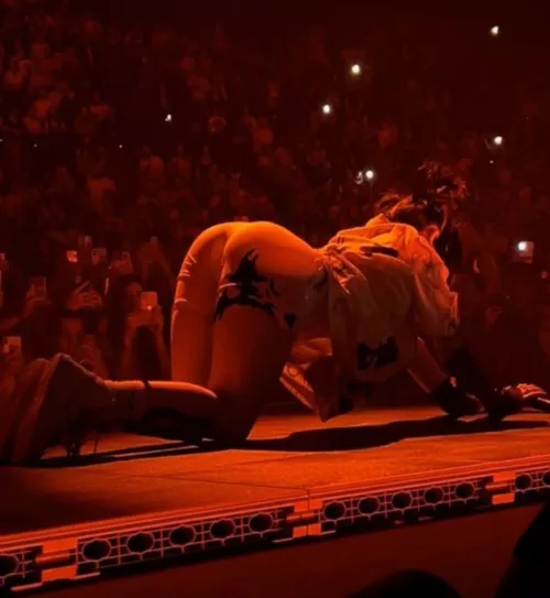 Billie Eilish is suspiciously skilled at arching her back and showing off that big ass of hers