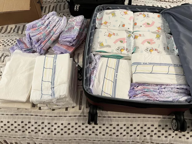Ready for my trip. I made them fit loooool. More diapers then clothes…..is that a bad thing????