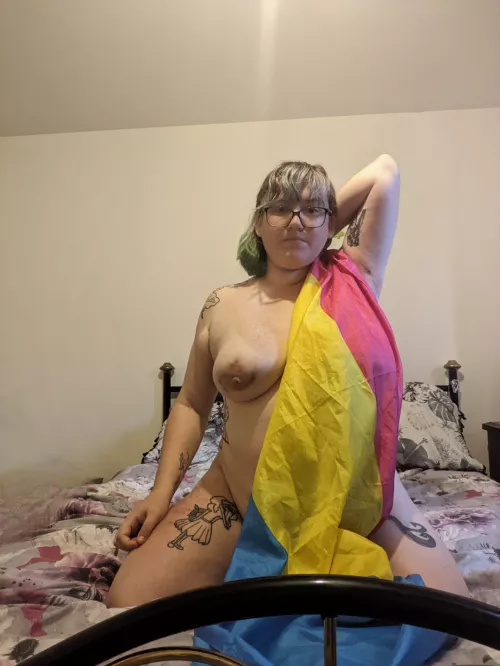 Posing with my pride flag. In desperate need of some female validation cause damn there are a lot of men in my town. Fucking exhausting