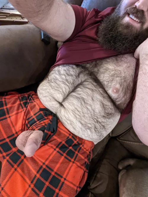 Just sitting on the couch. Work shirt and pajama pants! 😁