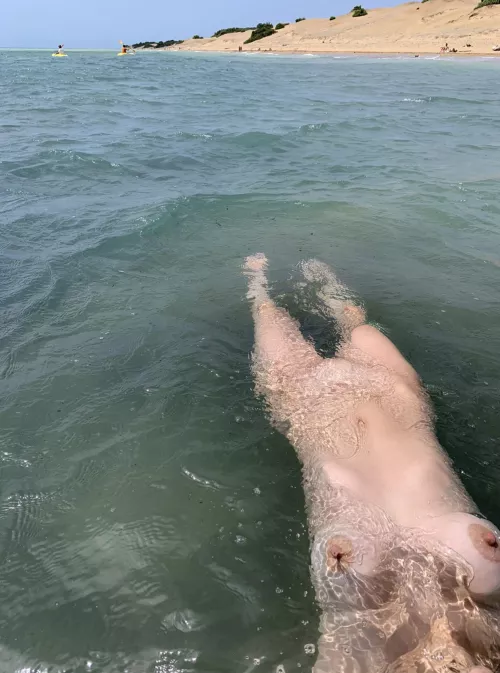 Some boobs, areolas and a nice beach