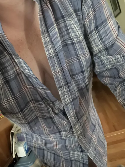 It started raining outside so I got chilly and had to put a shirt on....