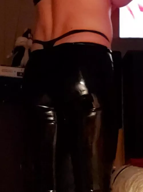 (M38) My girlfriend thinks that guys can look good wearing latex leggings, even better when there's a thong popping up.