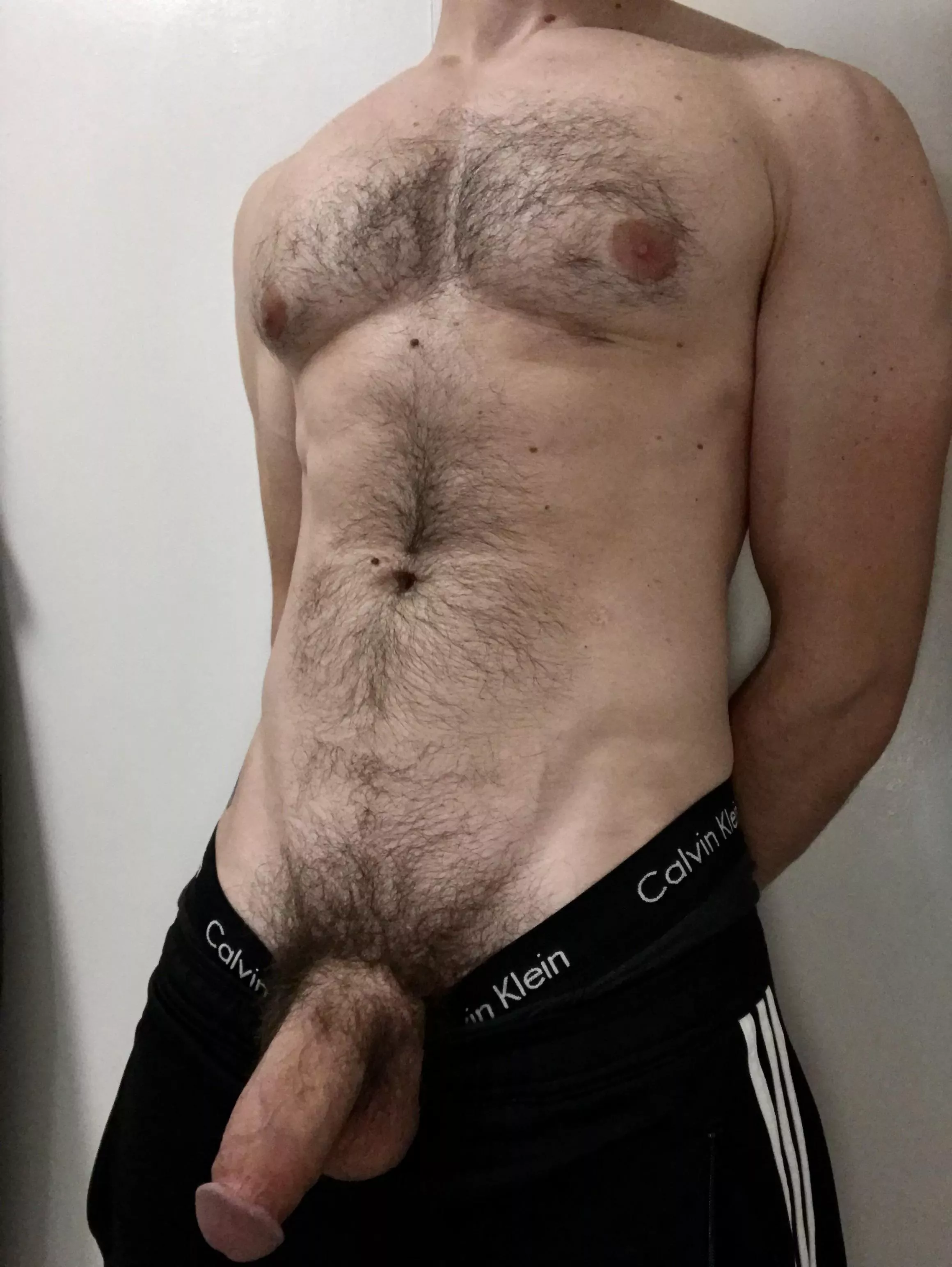 [30s] There’s something about flopping it out of Adidas track pants.
