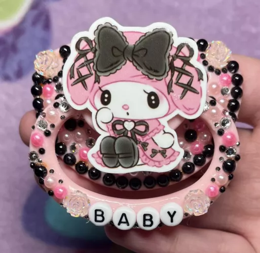 A My Melody paci I made for my shop! 💖