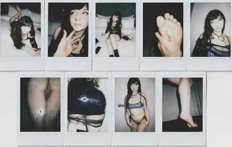 a series of polaroids my gf took of me (she has a foot fetish lmao)