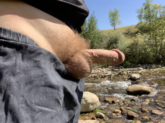 Down by the creek, fishing for a blowjob