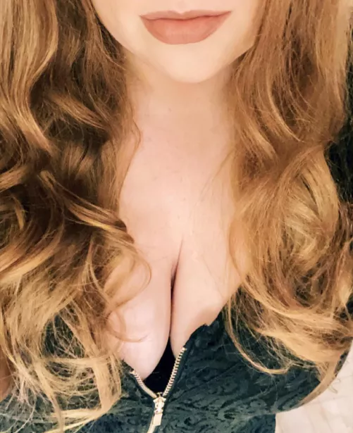 Finally Friday. Cleavage and curls.