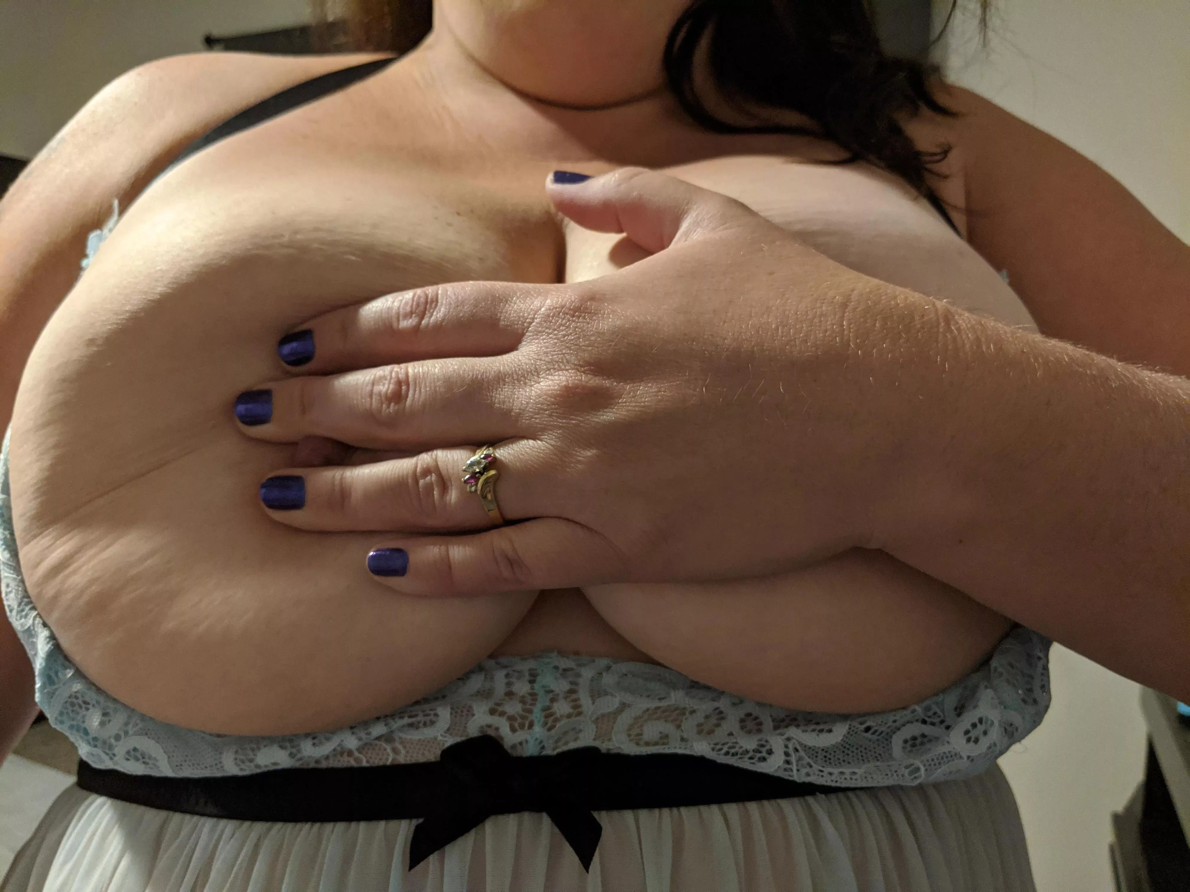 her hand is full