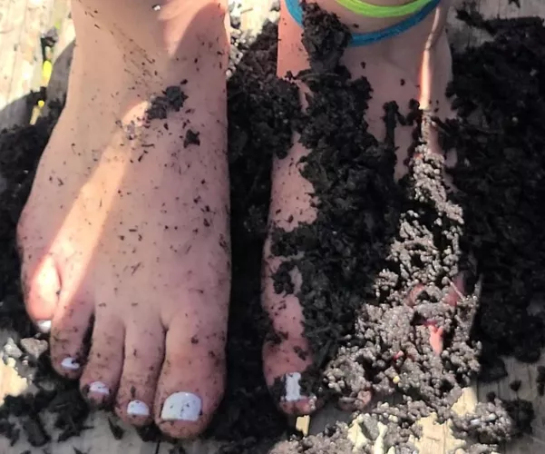 hose soaked garden soil in between my toes [f]
