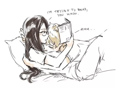 laying in mommy's lap while she's reading
