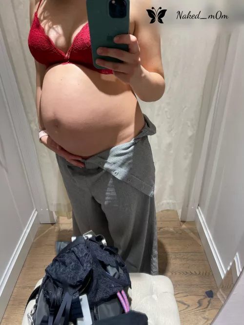 My favorite part of changing rooms is showing my pregnant belly