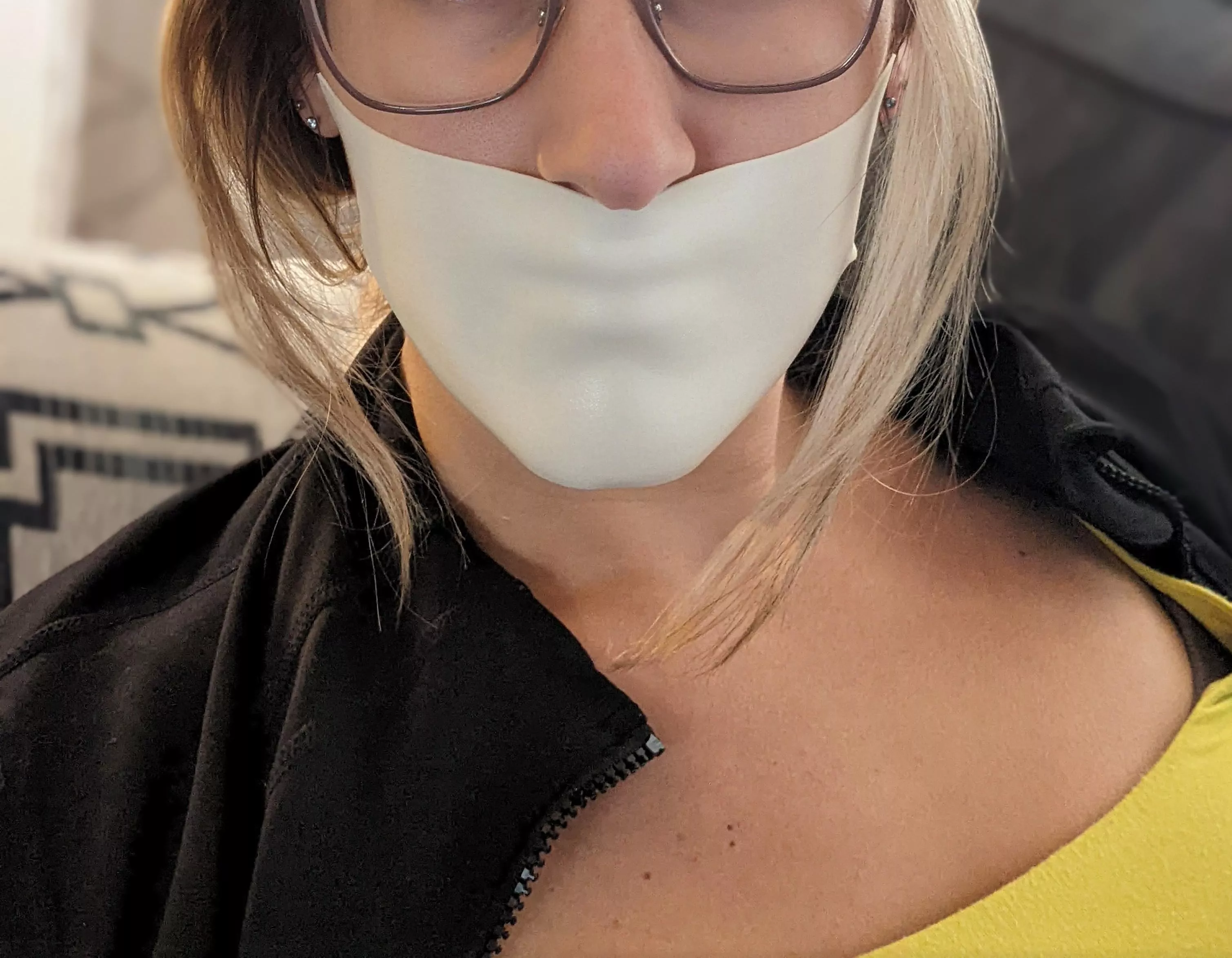 Ordered to wear a microfoam gag for the evening. I love the feeling of it stretched over my lips 😍