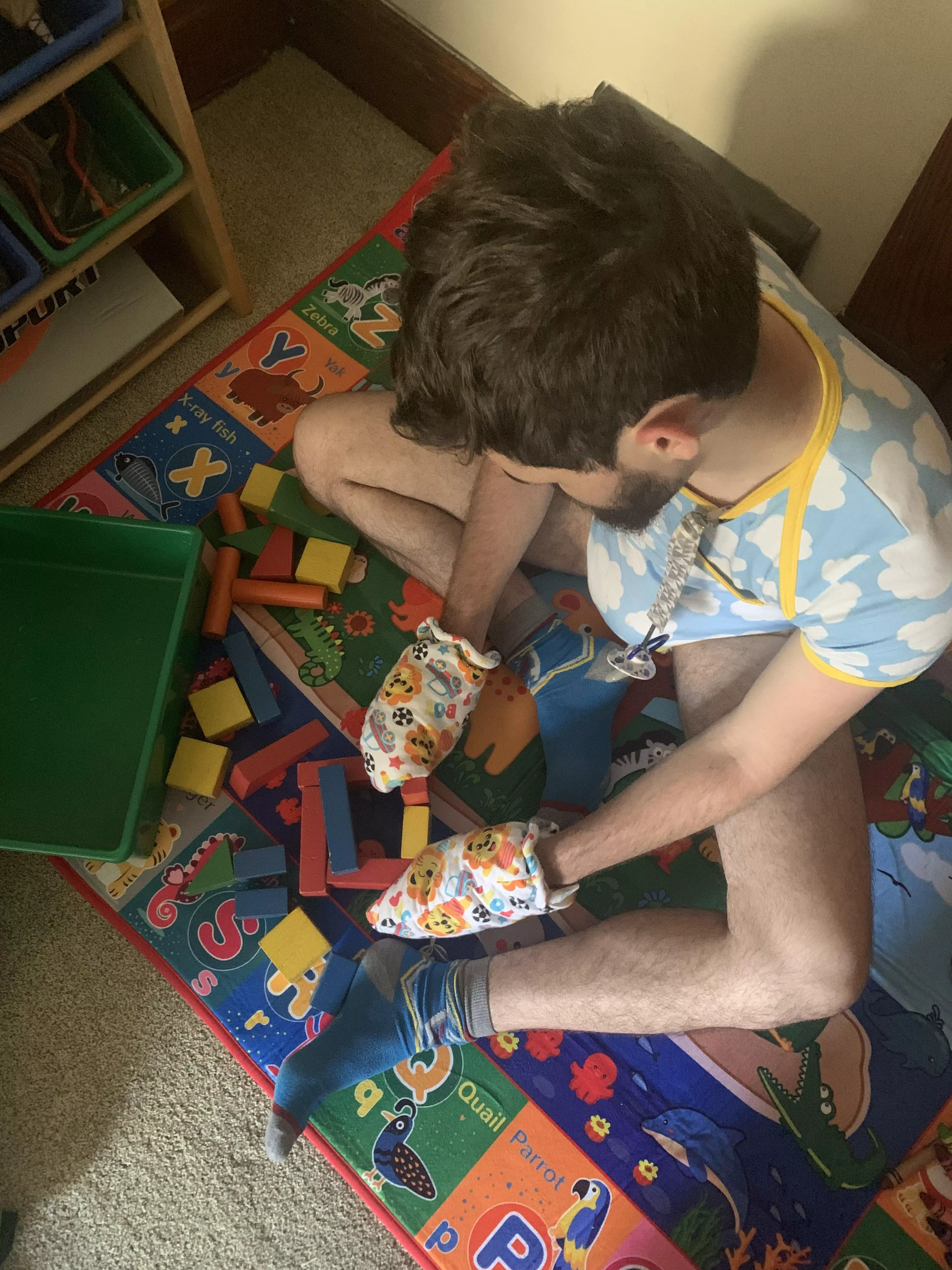 Playing with his blocks🟥🟨🟦