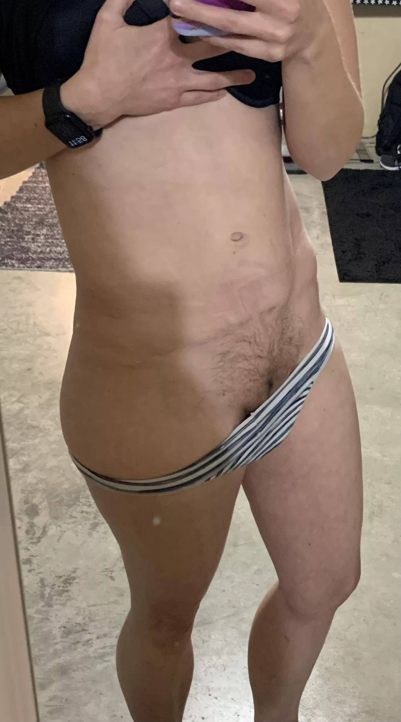 Posting for my sexy wife (w/ permission) showing her abs progress